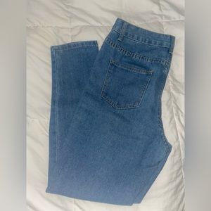 Blue skinny jeans with distressed knees